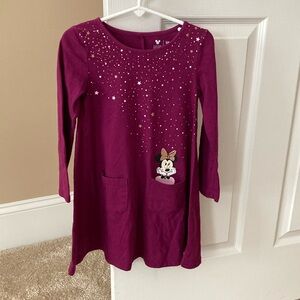 Girls purple dress. Minnie Mouse coming out of pocket. Shimmery stars. Wore few